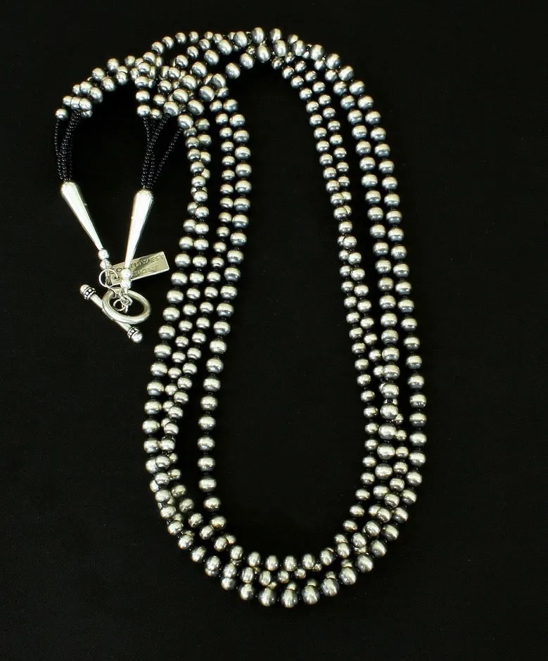4-Strand Oxidized Sterling Silver Bead Necklace with Sterling Silver Cones and Toggle Clasp